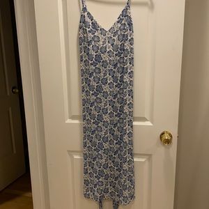 Reformation blue floral midi dress, with strap that ties in the back.